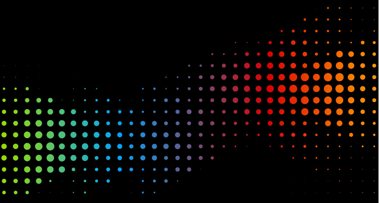 A field of coloured pixels fading from green through blue to red and orange